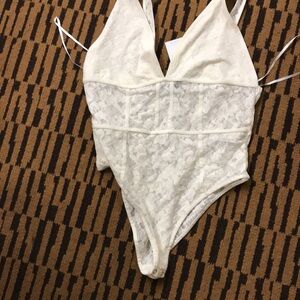 Forever 21 body suit wear size: XL color: Vanilla  . Brand new